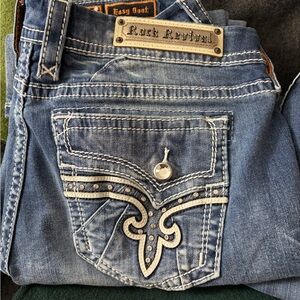 Rock Revival Blue Denim Jeans with Embellished Pockets, 46 1/2 inches long